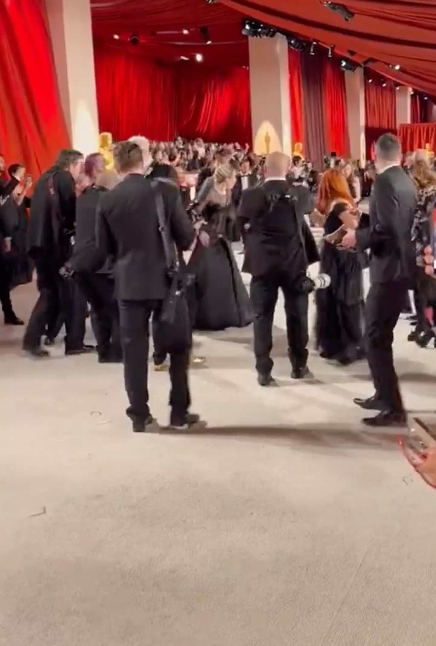 Gaga rushed back to help the photographer.