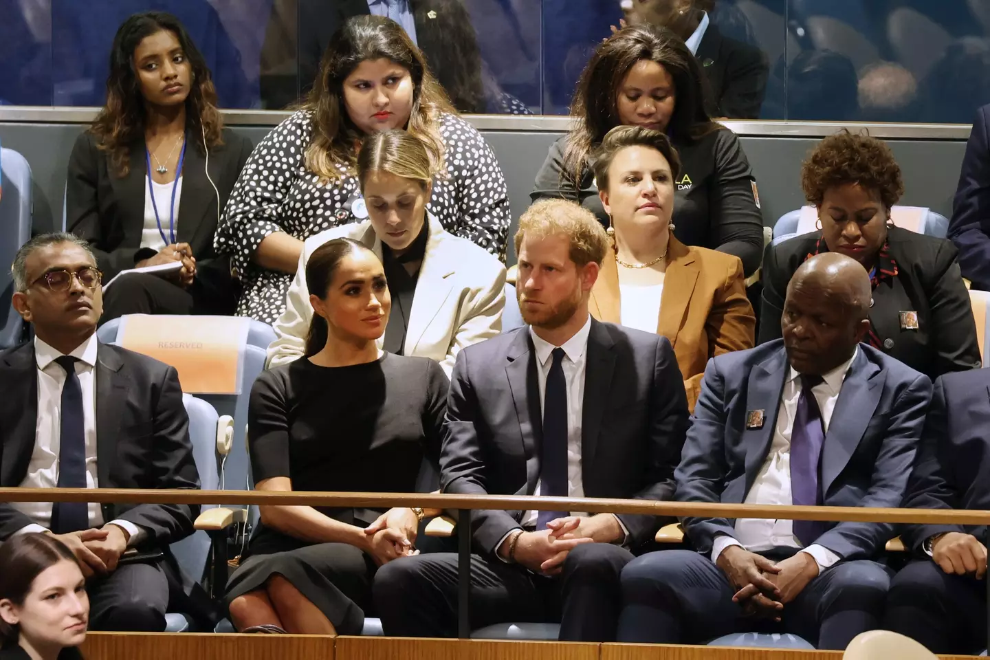 Meghan Markle gave the woman a bottle of water.