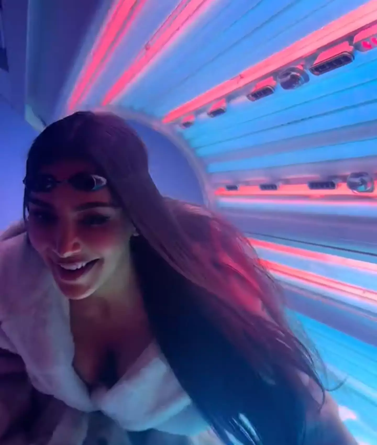 Do you have a tanning bed in your office? Of course, Kim Kardashian does.