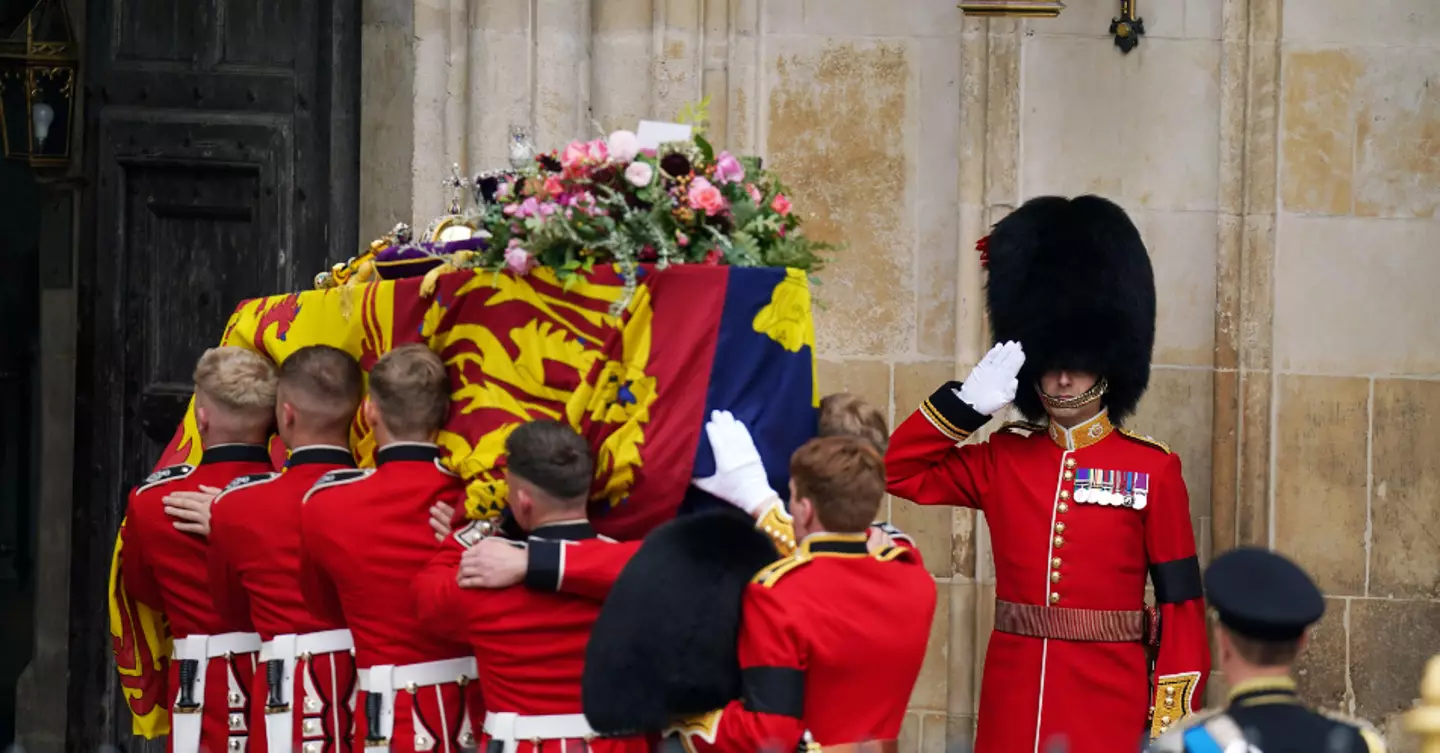 The wreath of flowers on top of the Queen's coffin had a special tribute to Prince Philip.