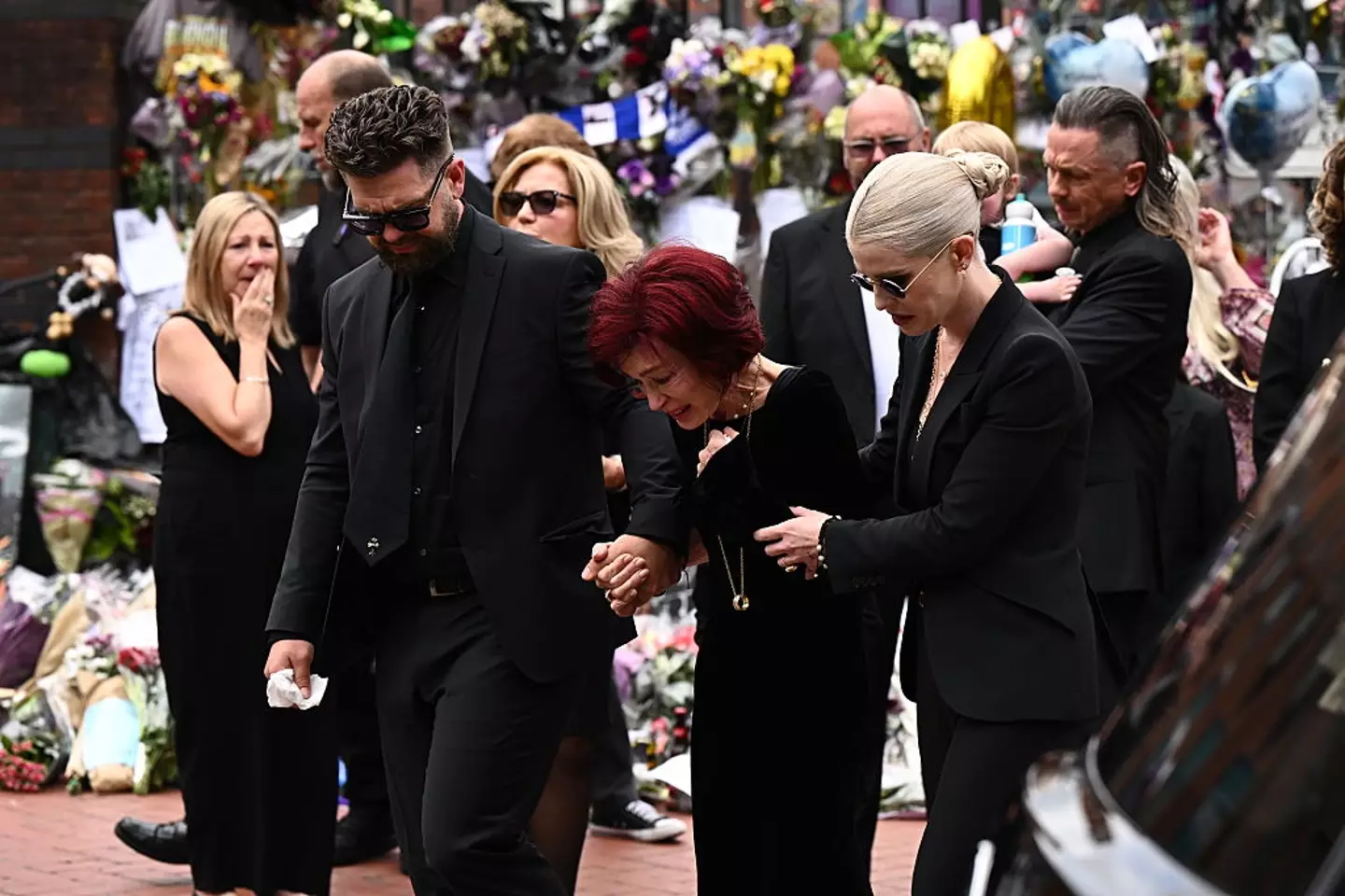Her children, Jack Aimee and Kelly, remained by her side throughout the event (Leon Neal/Getty Images)
