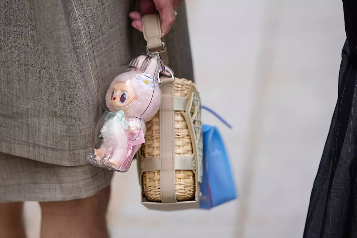 The dolls have soared in popularity in recent months and are often seen clipped to people's handbags (Edward Berthelot / Getty Images)