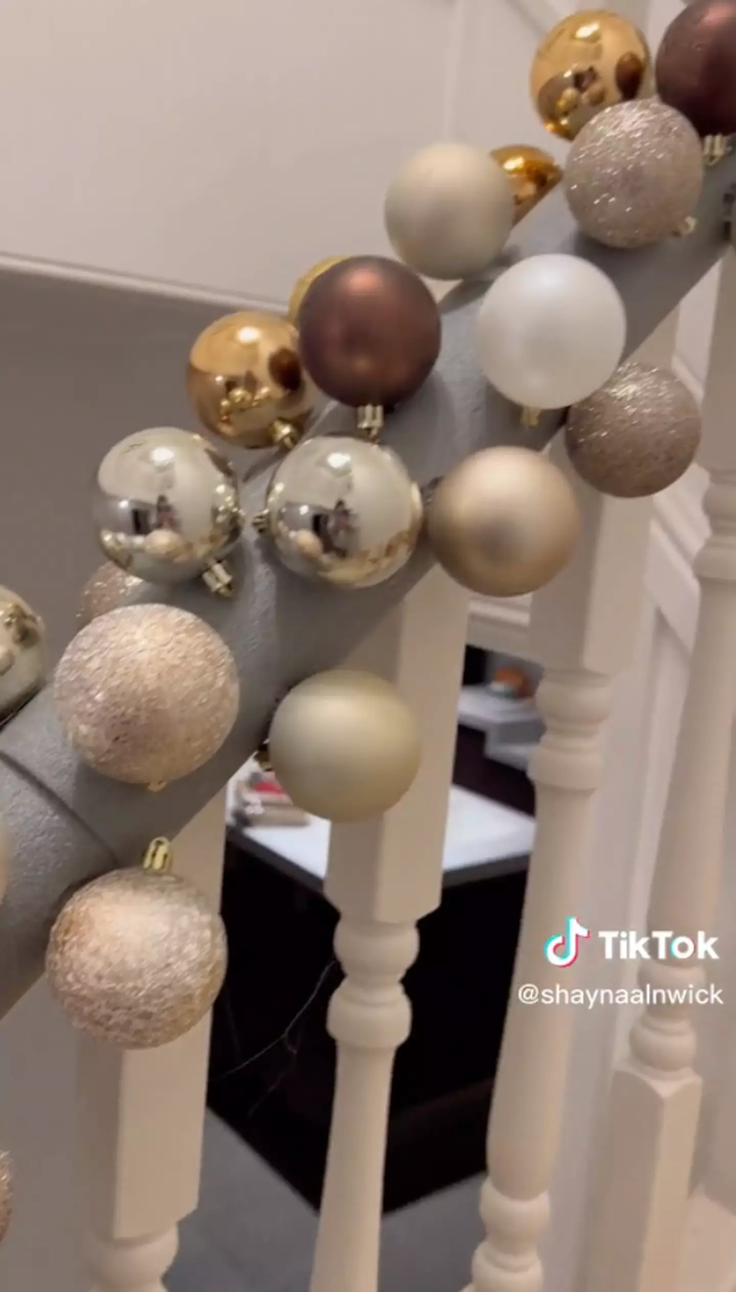 Shayna begins with the big decorations.
