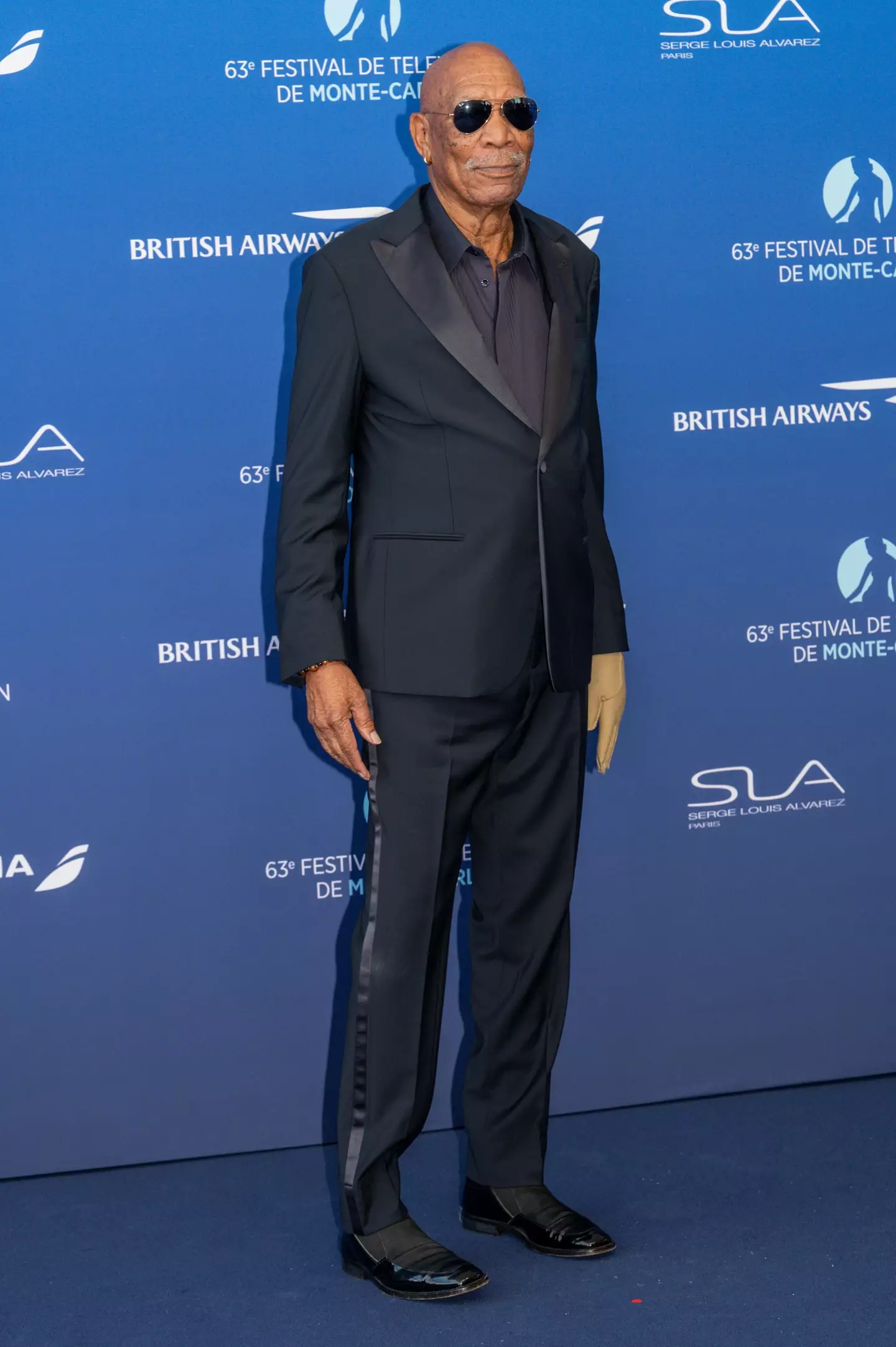 Morgan Freeman wears a compression glove due to sustaining injuries in 2008. (Stephane (Cardinale - Corbis/Corbis via Getty Images)