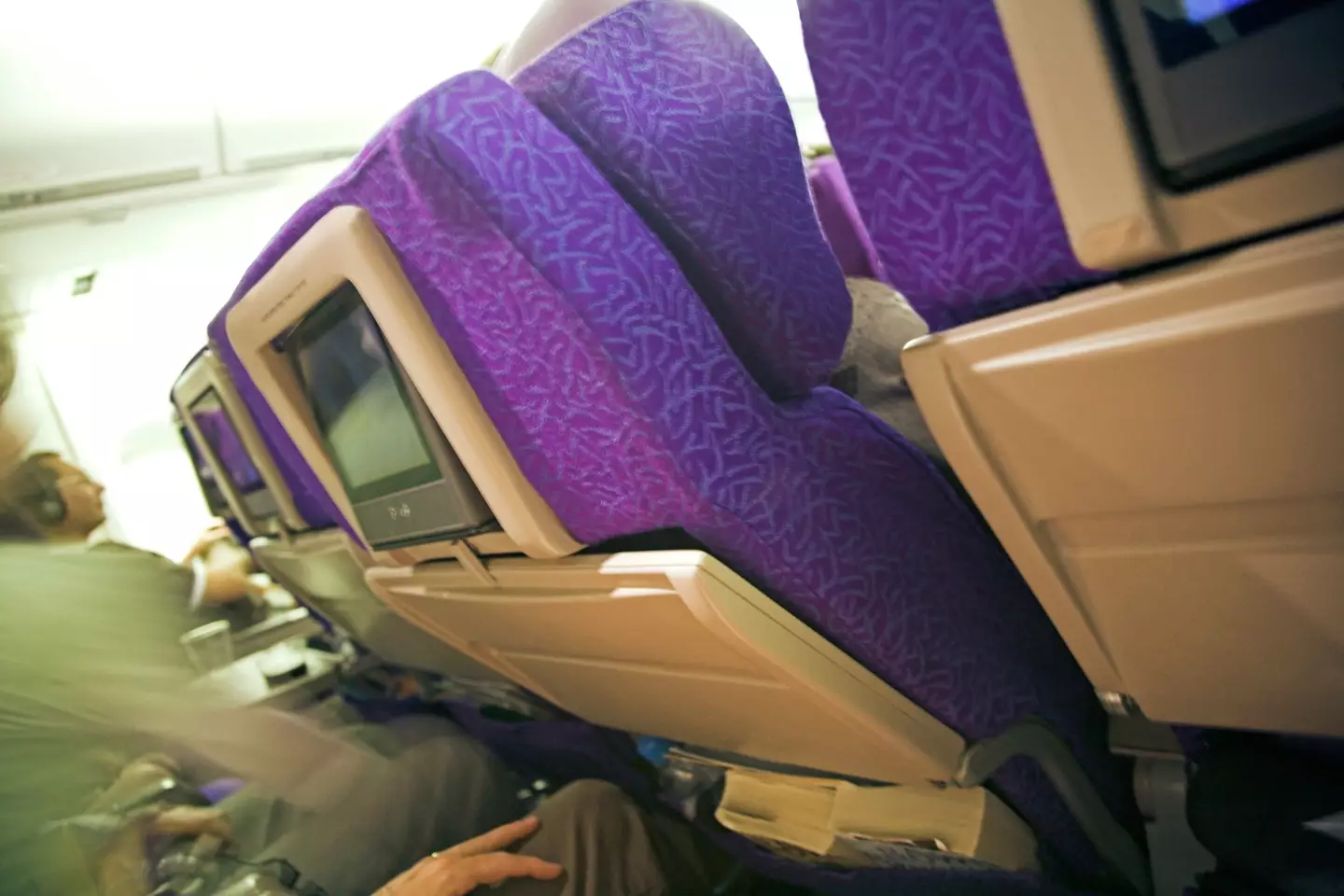 The post sparked a debate about whether it’s OK to recline your seat.