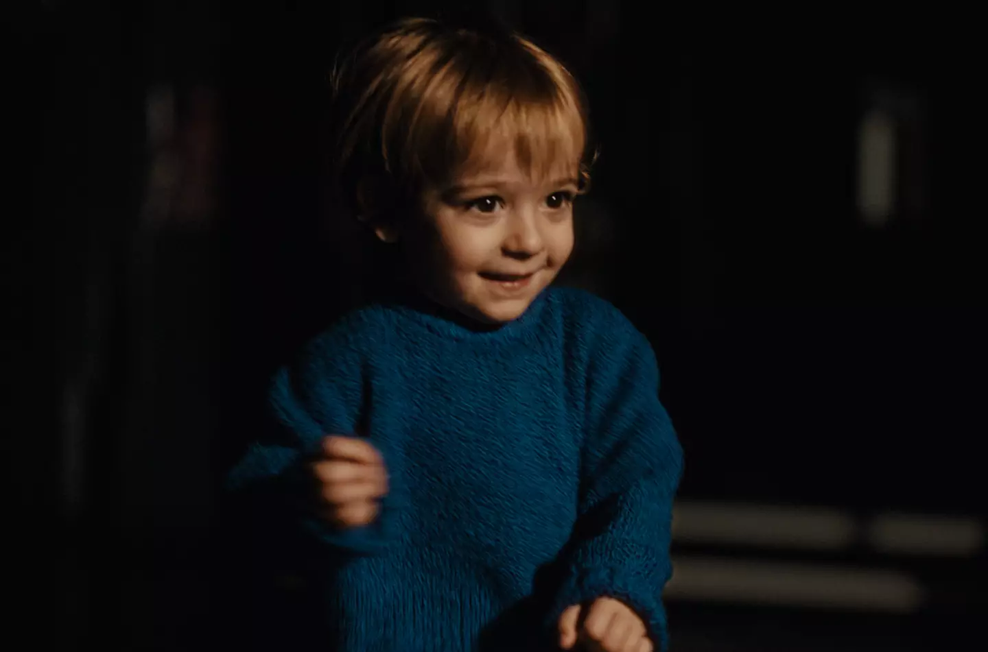 His son then features as a toddler (John Lewis)