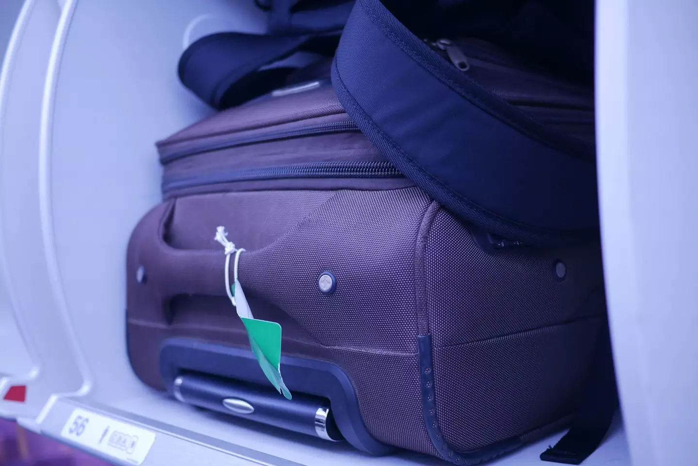 A flight attendant has explained why staff don’t stow luggage for passengers.