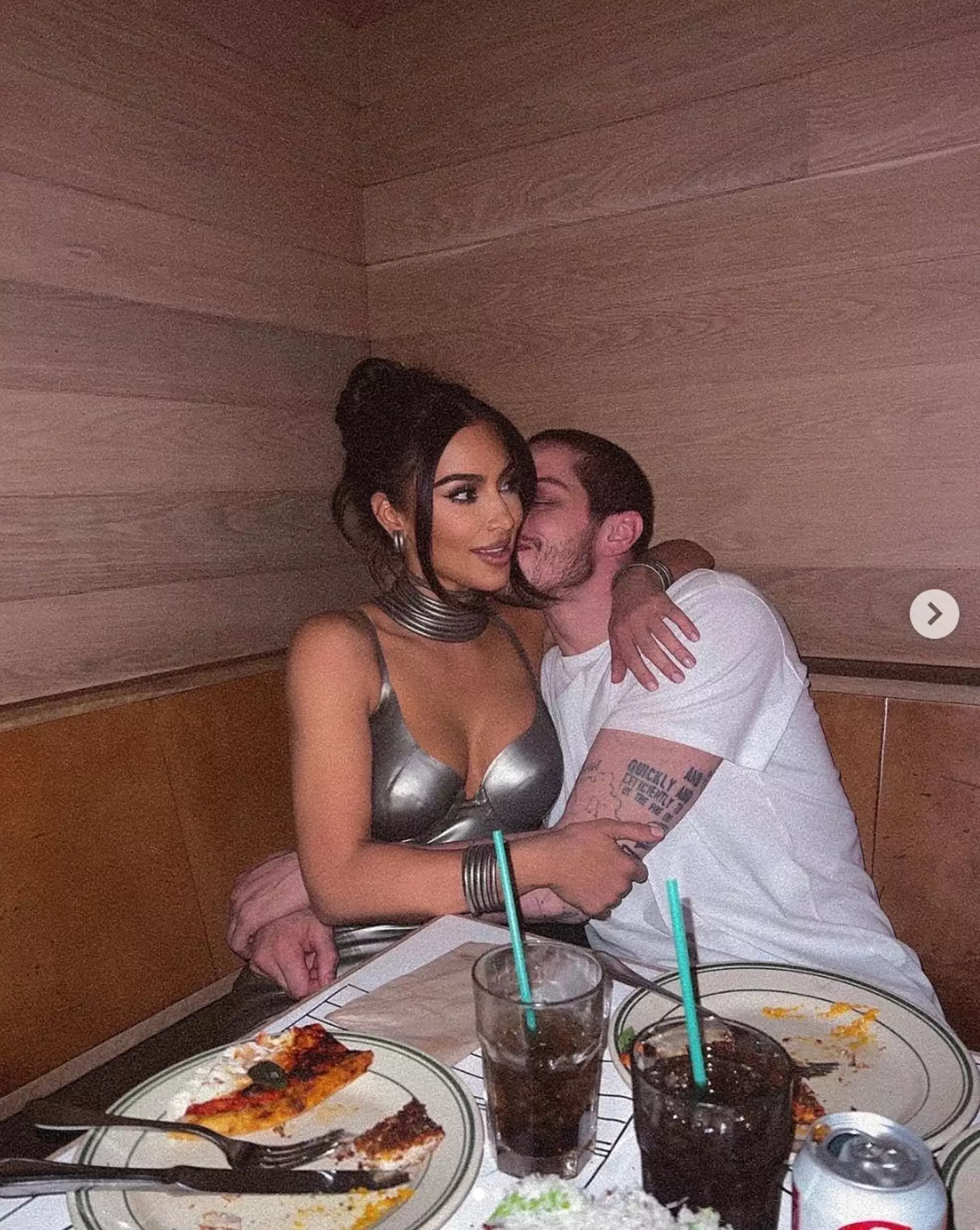 Fans are losing it over a recent photo Kim Kardashian shared with Pete Davidson - because of their dinner order (Instagram @kimkardashian).