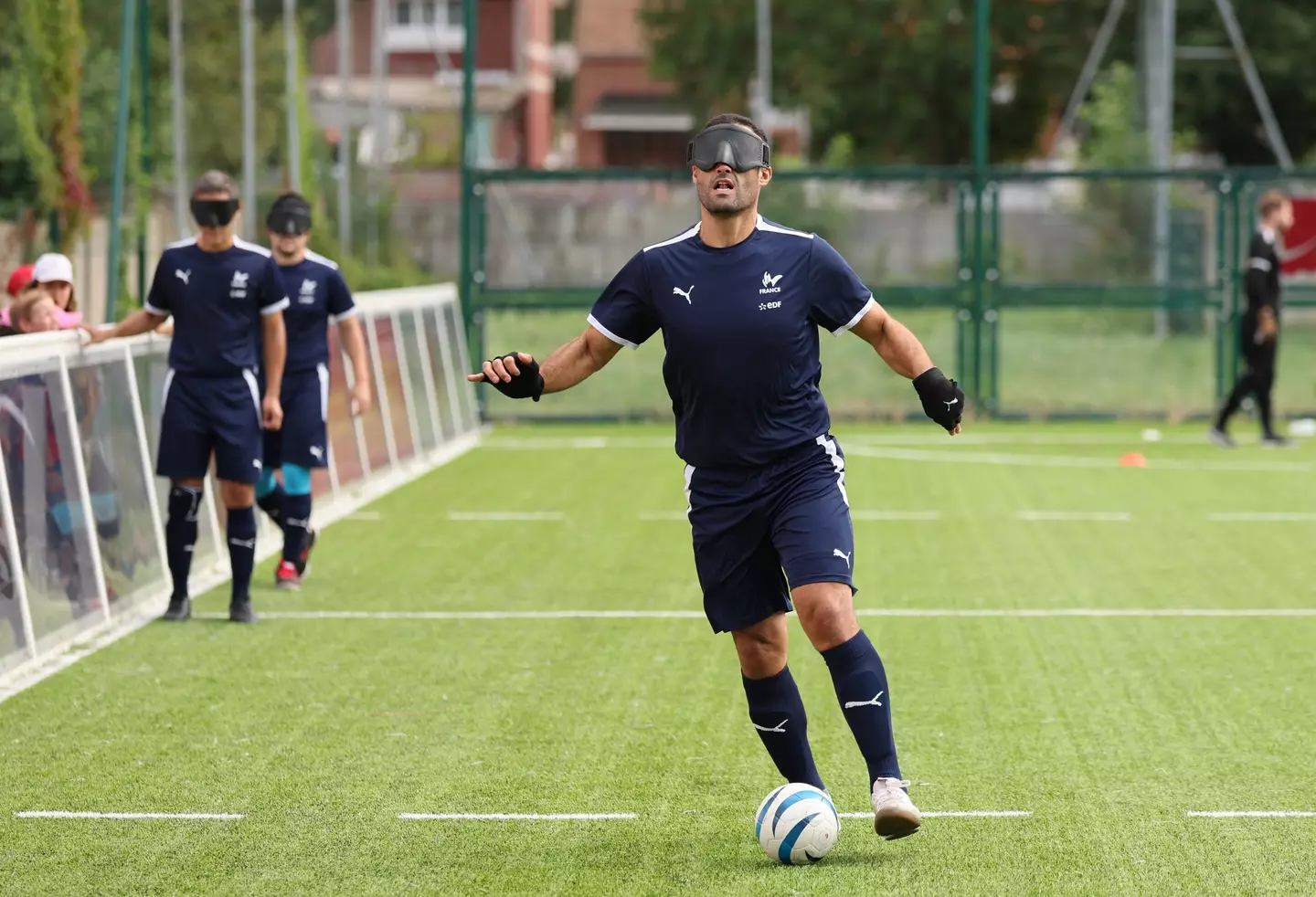 Paralympic football players must wear eye masks while playing. (FRANCOIS LO PRESTI/AFP via Getty Images)