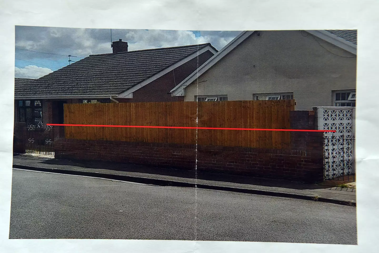 The council's guidelines for what Angela needs to do with her fence.