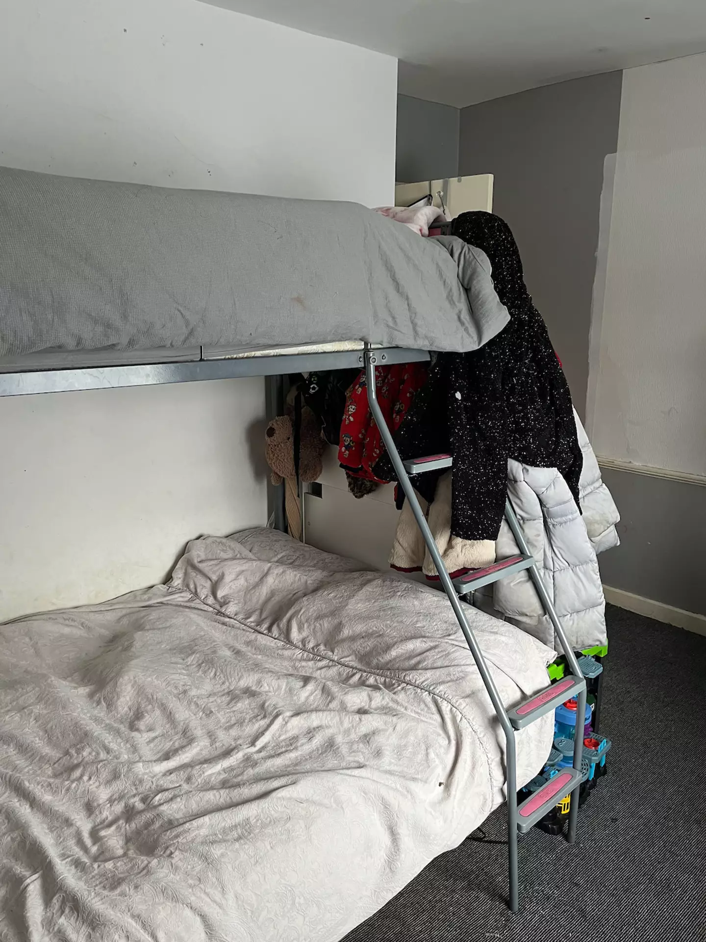 There are two bunk beds, two single beds and a double bed.