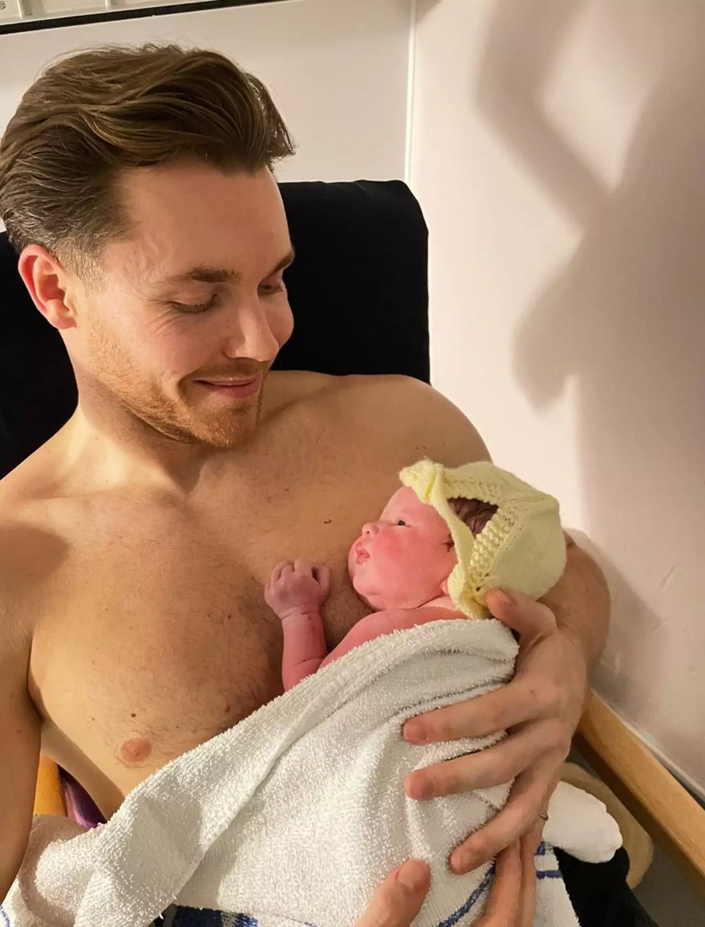 Boyfriend Sam looked besotted with the little boy.