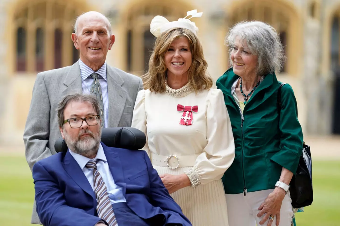 Kate pictured with husband Derek and her parents Gordon and Marilyn Garraway.