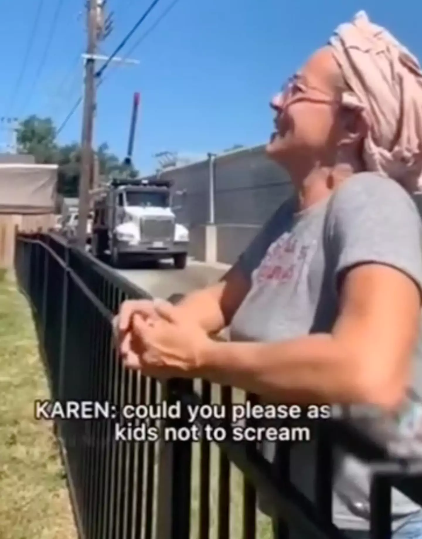 A woman has gone viral after she was captured on video telling a group of school children playing in a local park to be quiet.
