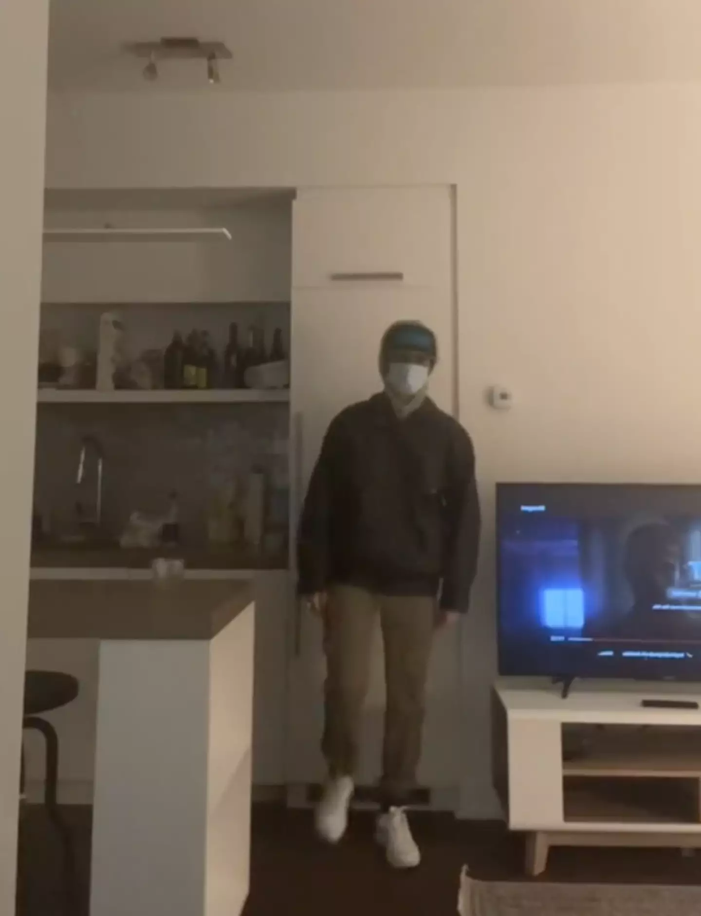 Tia wears dark, baggy clothes on the job.