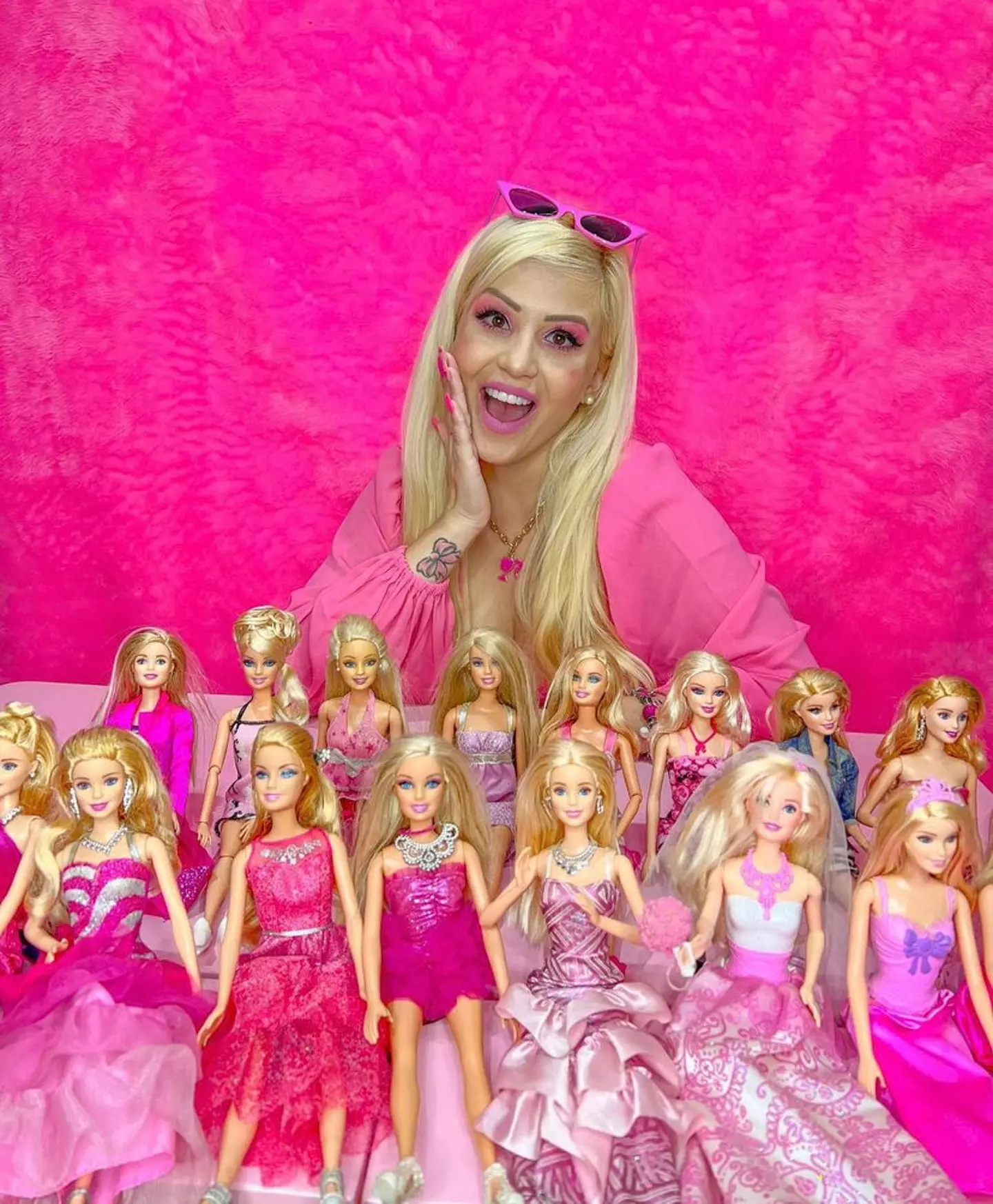 Bruna with her Barbie dolls.