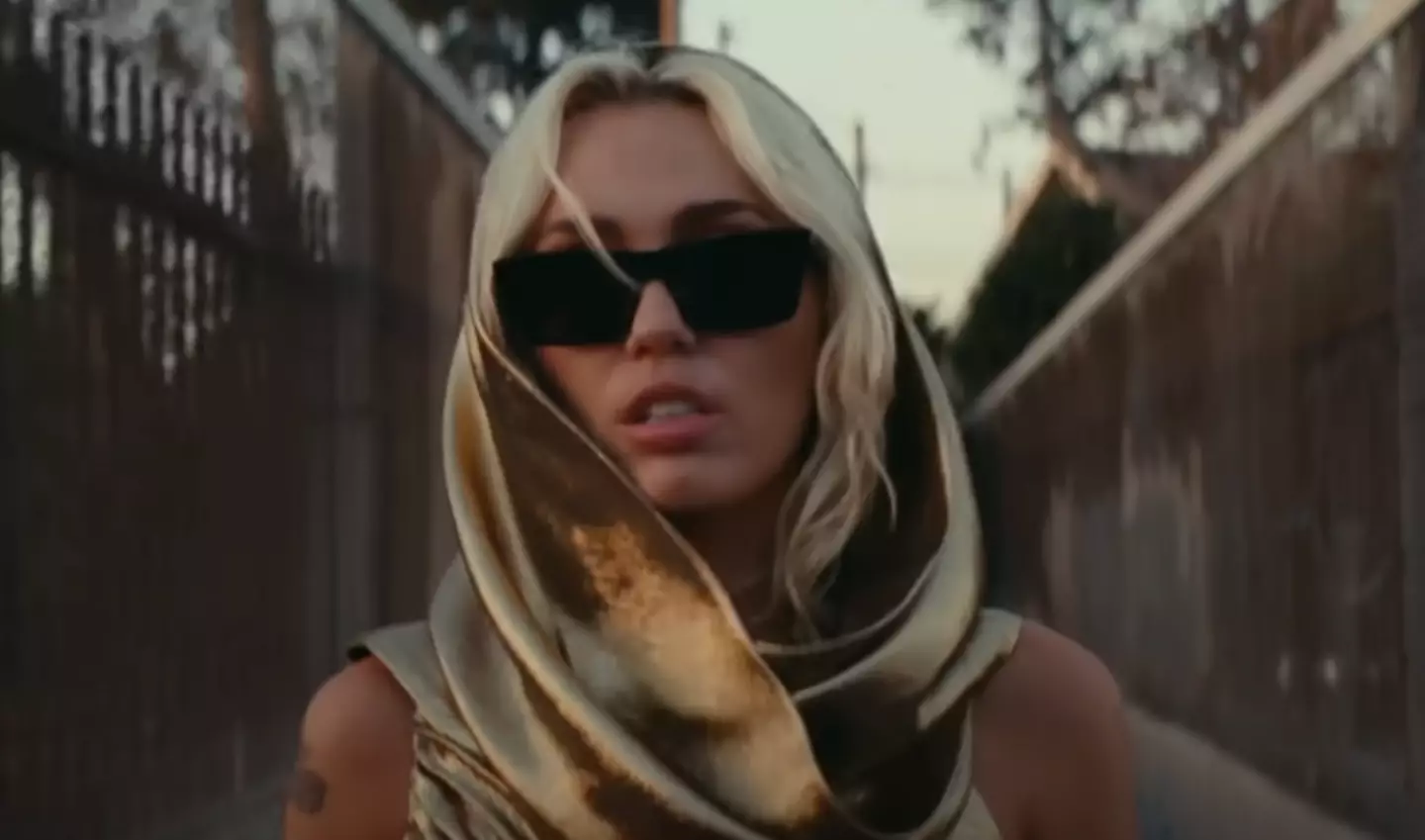 Miley Cyrus in the video for 'Flowers' (Columbia)