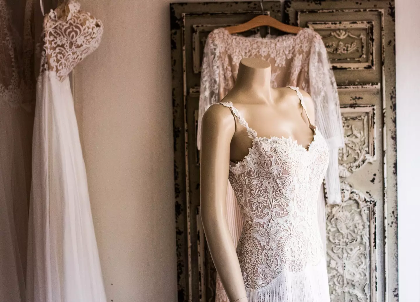 Should the bride say yes to the dress? Or change to keep her in-laws happy? (