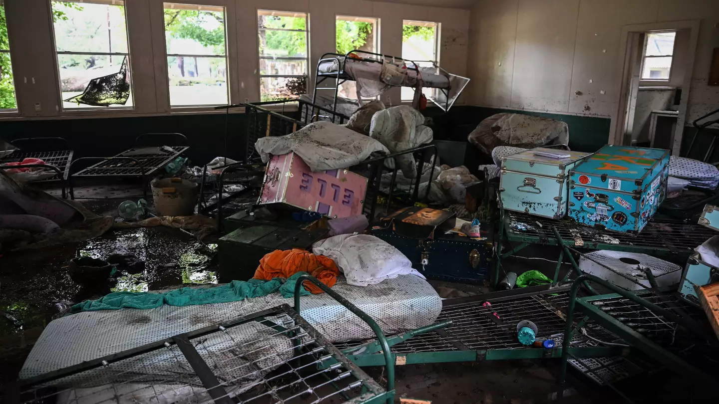 Camp counsellors wrote girls' names on their bodies before evacuating devastating floods that killed at least 82