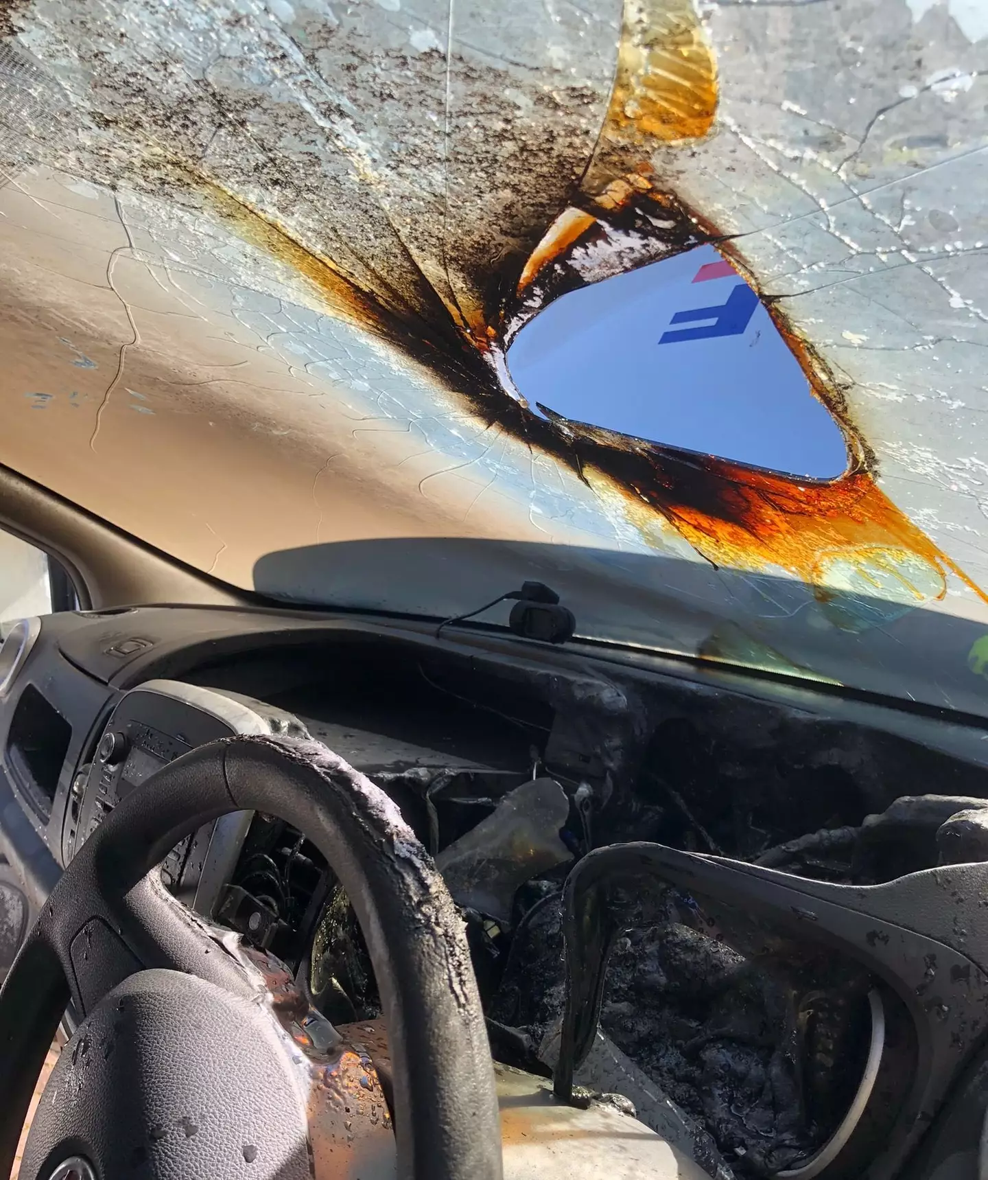 The car's interior completely melted in the heat.
