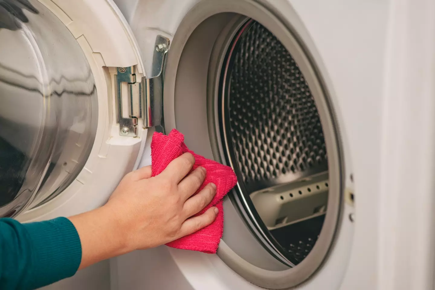 You're often told to leave washing machine doors open to prevent mould (Getty Stock Images/ Emilija Manevska)