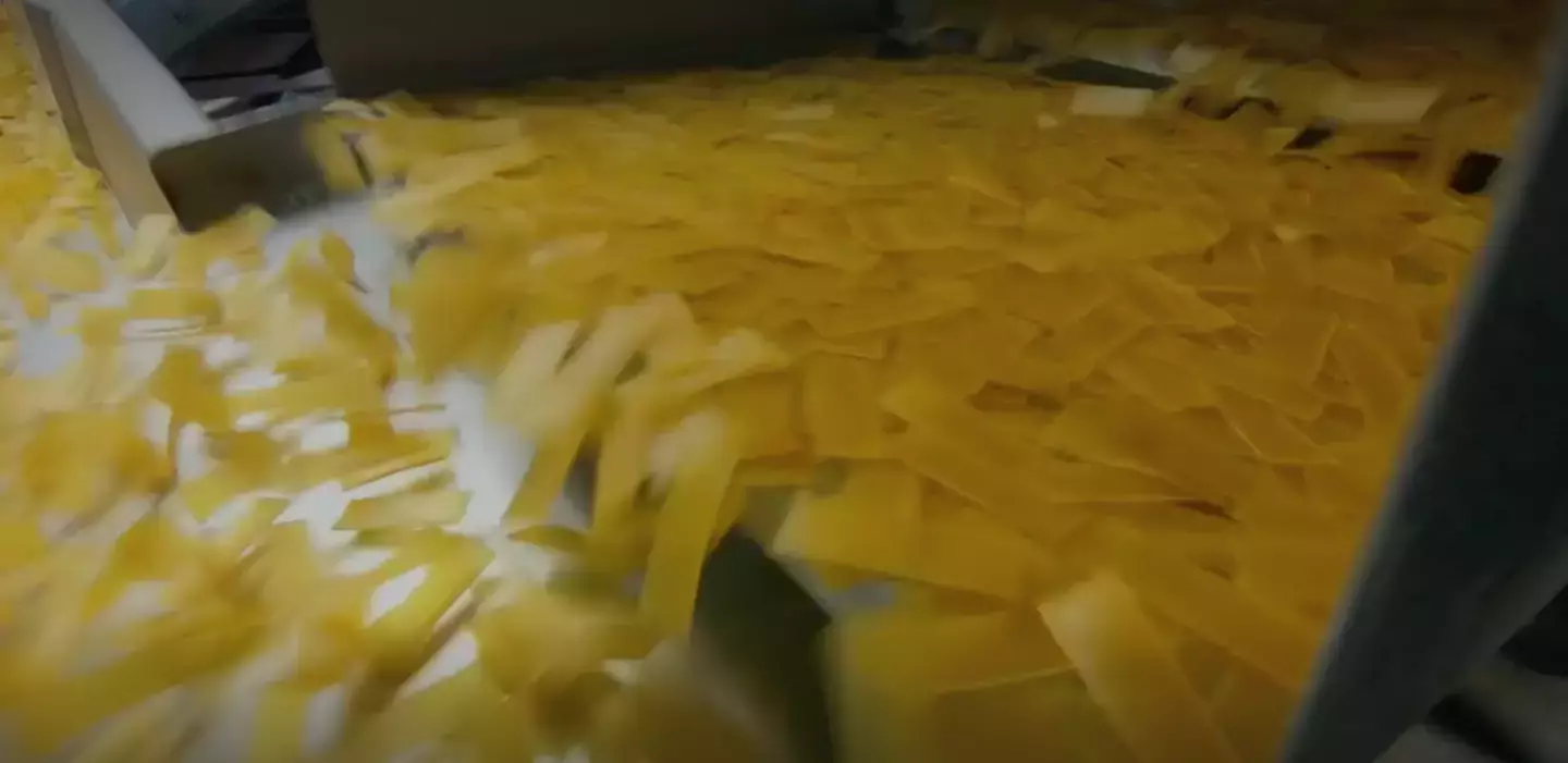 The sheet of dough is chopped into 40mm pellets (BBC)
