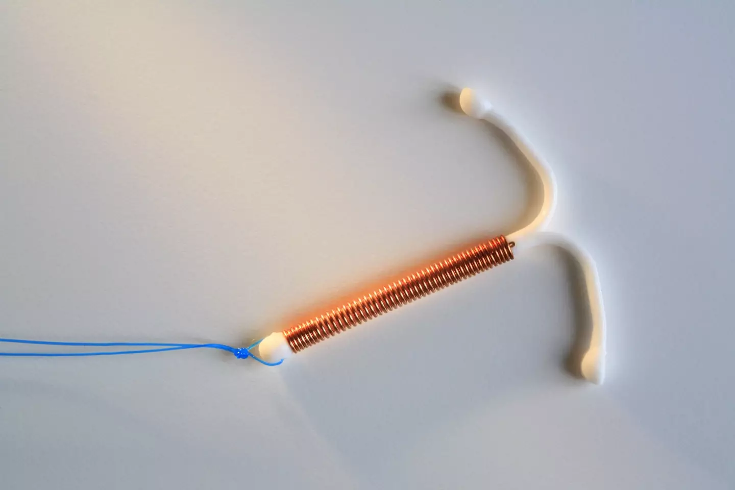 You should never attempt to remove an IUD yourself (