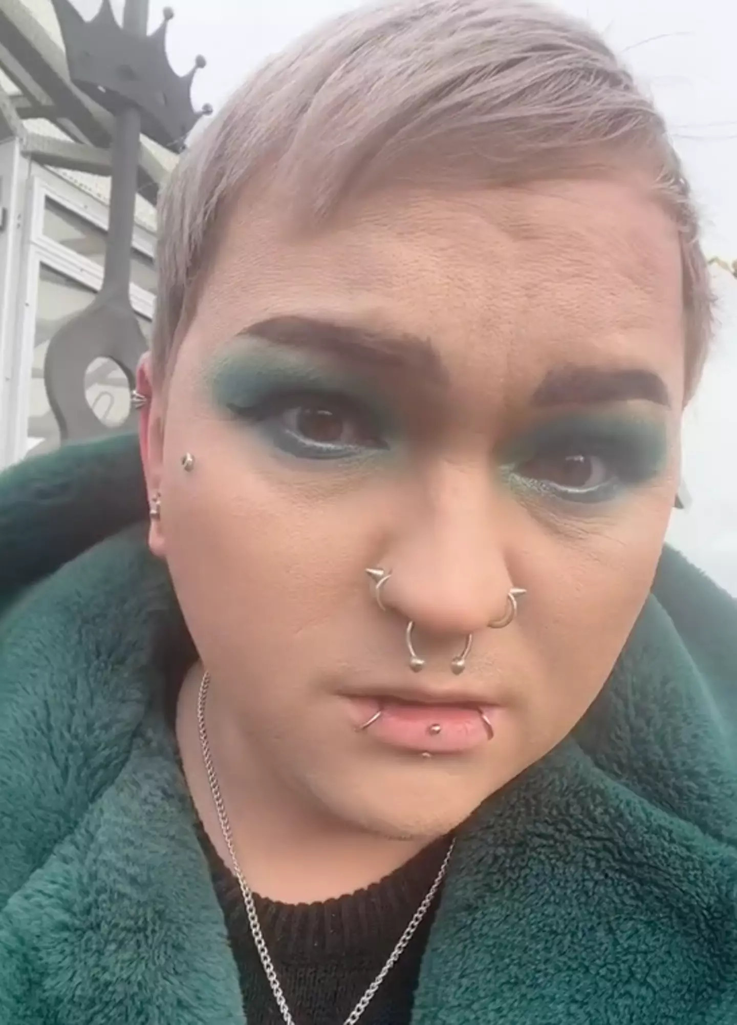 The body piercer refused the father's custom.