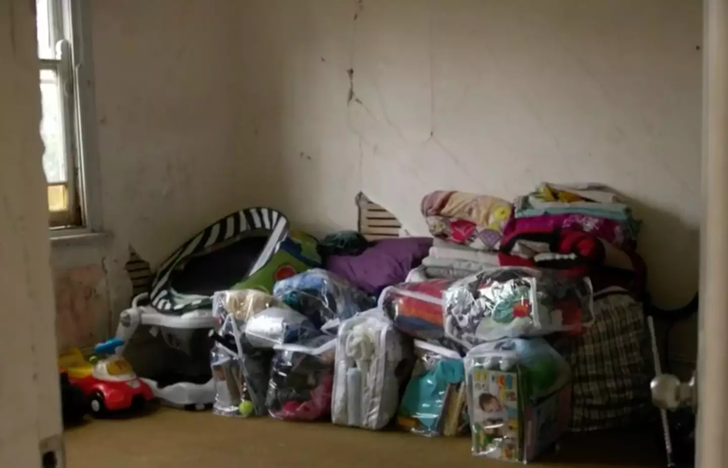 The mum had to give up belongings due to the mould.