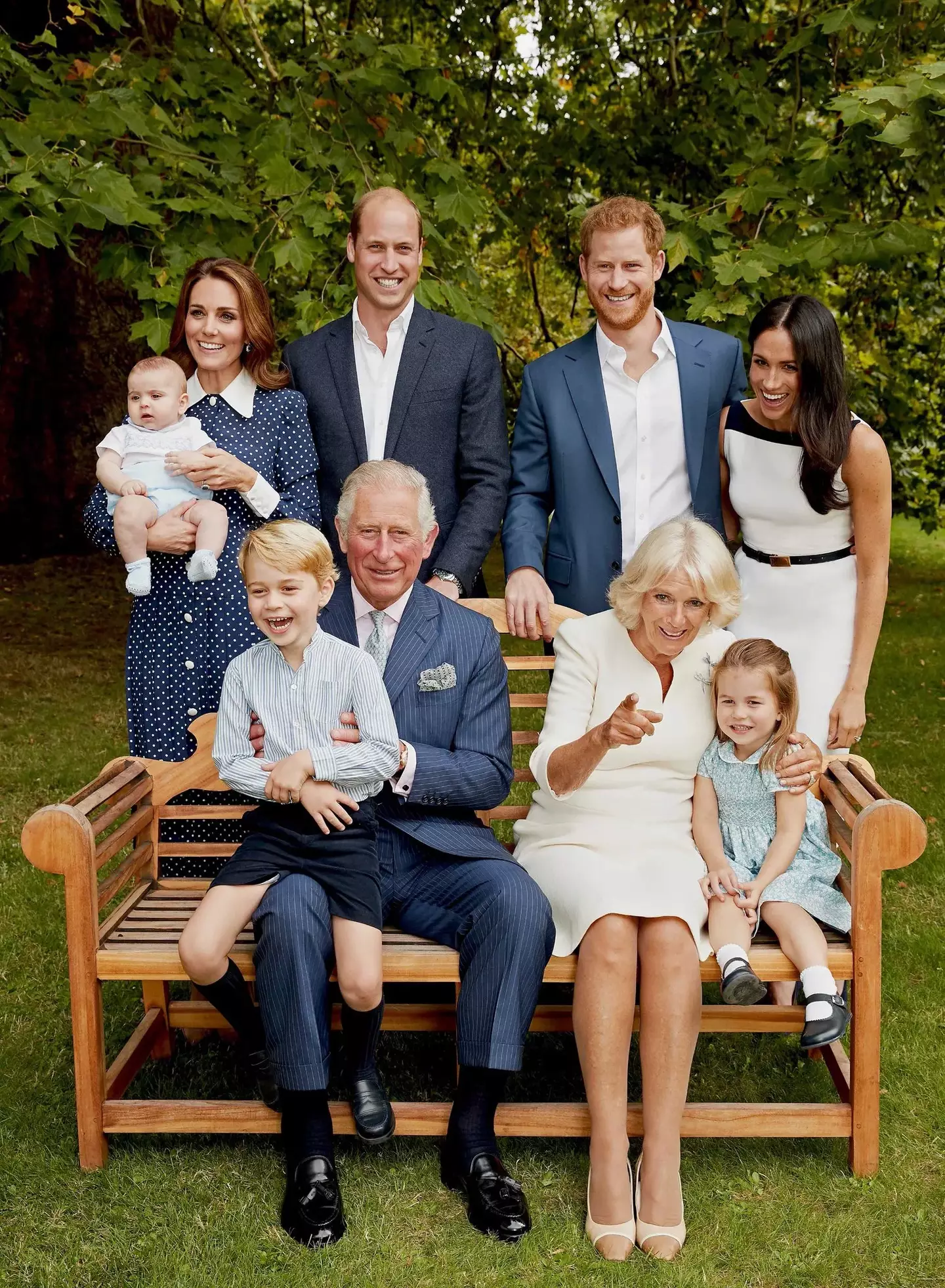 Meghan Markle can be seen laughing in the more candid image (Chris Jackson/Clarencehouse)