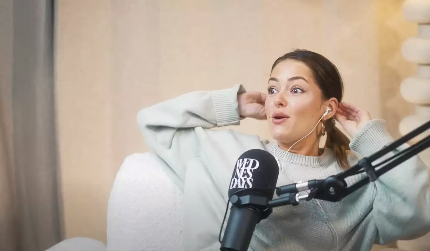 The woman kissed her boyfriend's brother.