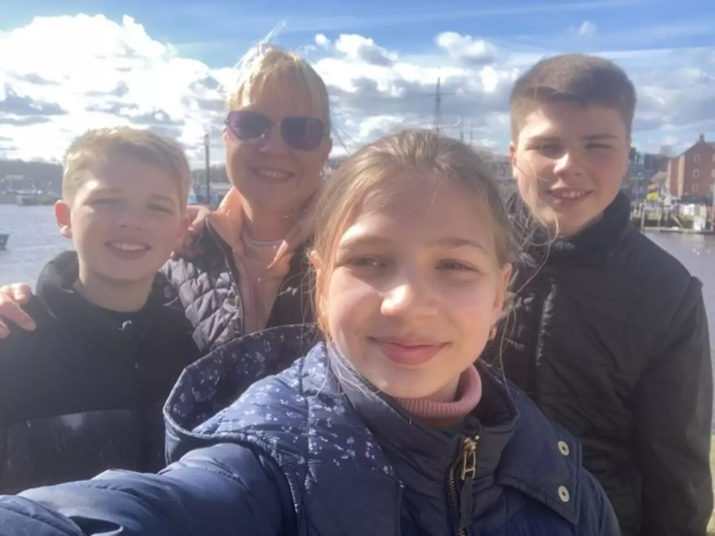 Louise with her three kids.