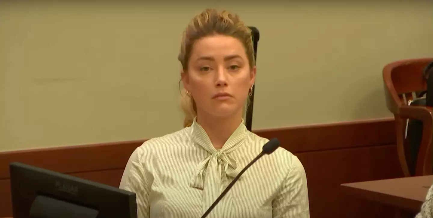 Amber Heard maintained eye contact with Johnny Depp. (