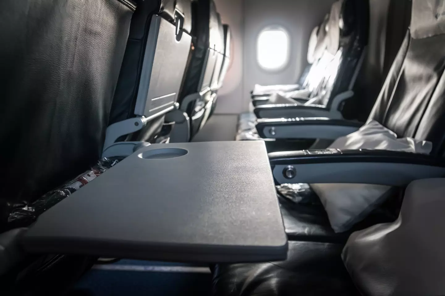 You may want to think twice when you next go to use a tray table when flying.