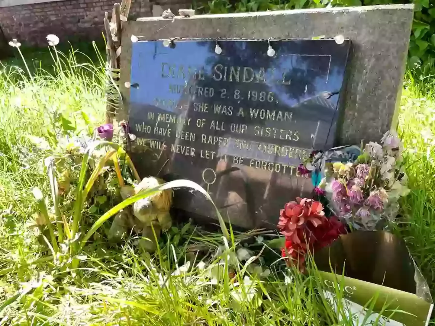A memorial for Diane Sindall, who was murdered in Merseyside in 1986 (PA)