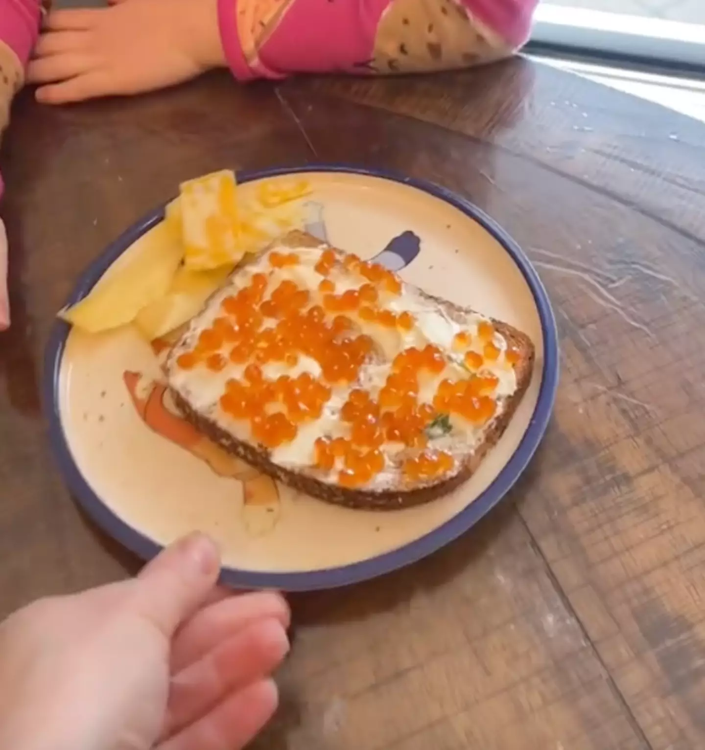 The kids asked for caviar with scallion cream cheese on bread.