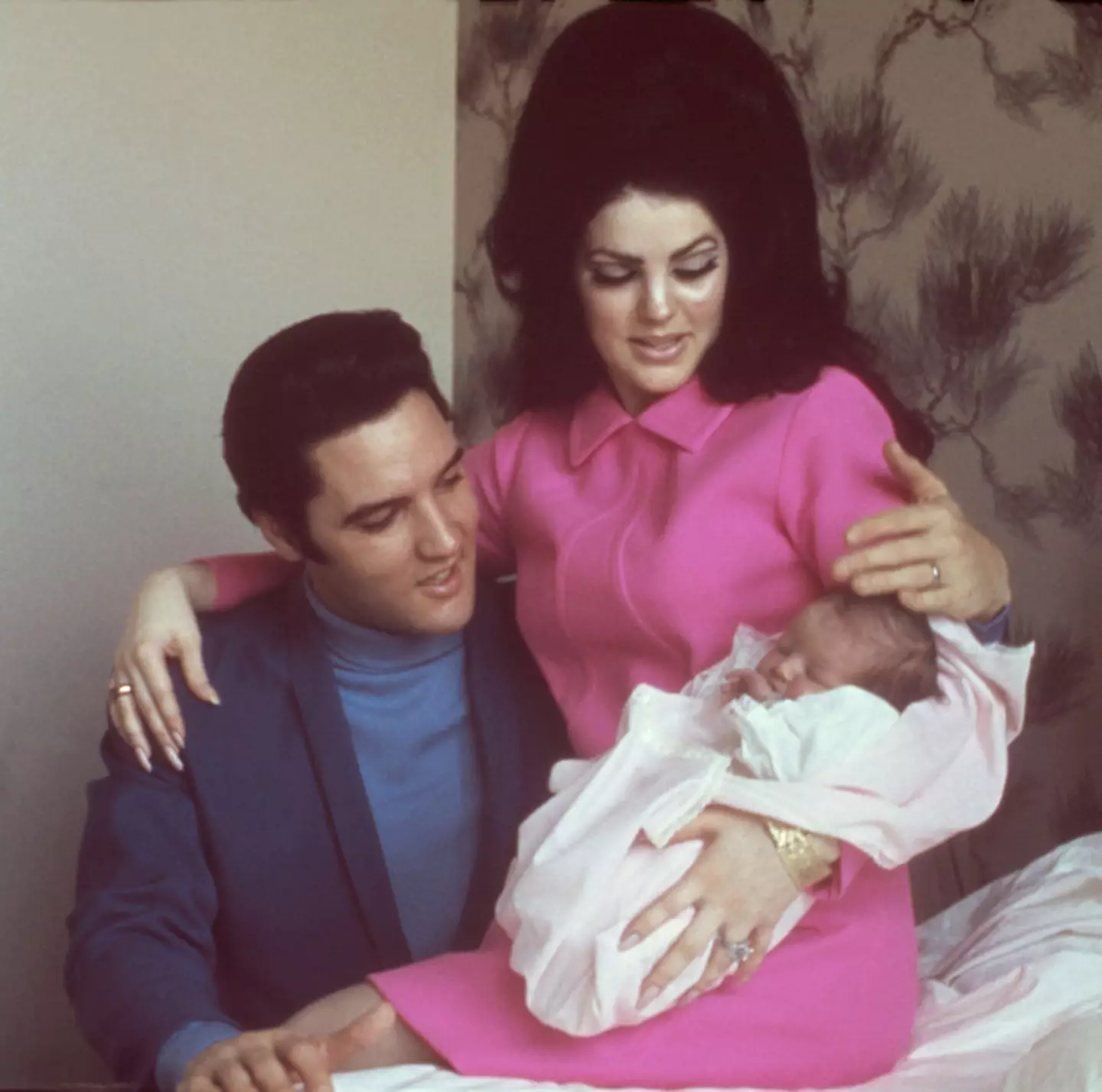 Lisa as a baby with her parents Elvis and Priscilla Presley (Michael Ochs Archives / Stringer / Getty Images)