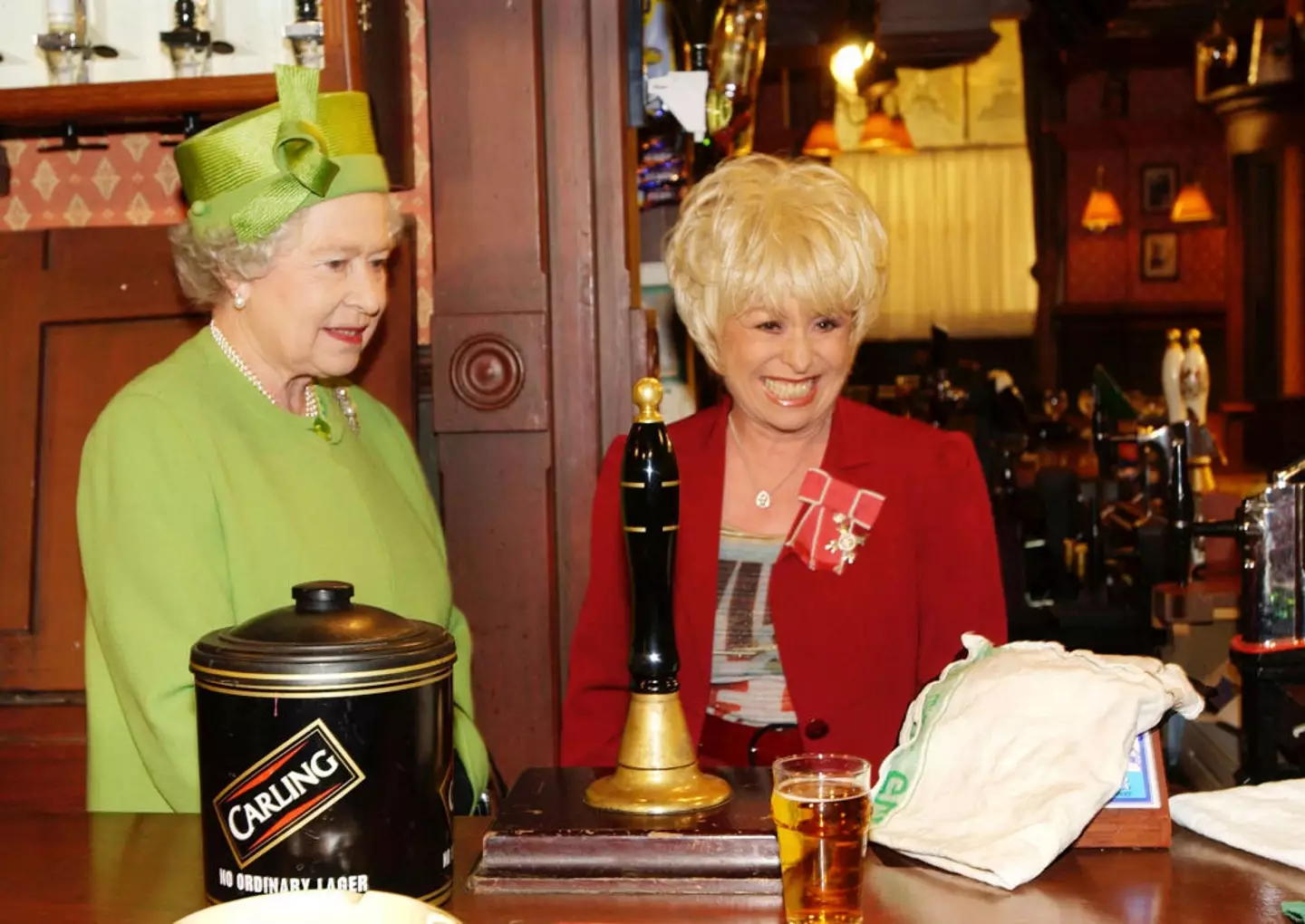 Barbara Windsor - pictured with the late Queen Elizabeth II - was best known for her role in EastEnders.