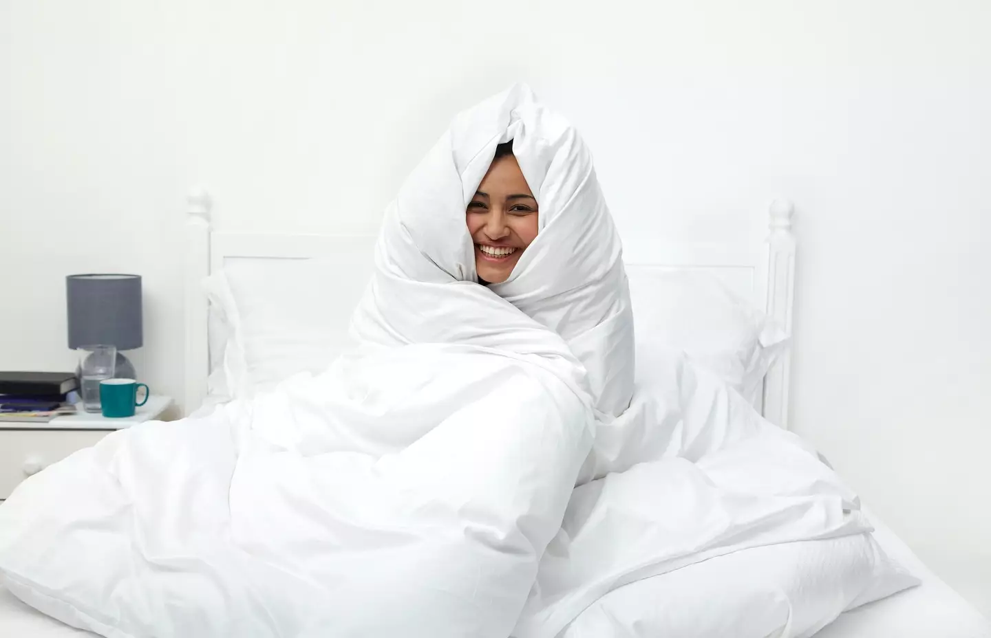 The trend involves staying in bed all day to recharge (Getty Stock Photo)