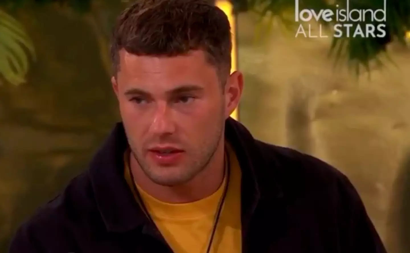 Curtis and Ekin-Su shared an awkward moment around the fire pit. (ITV)