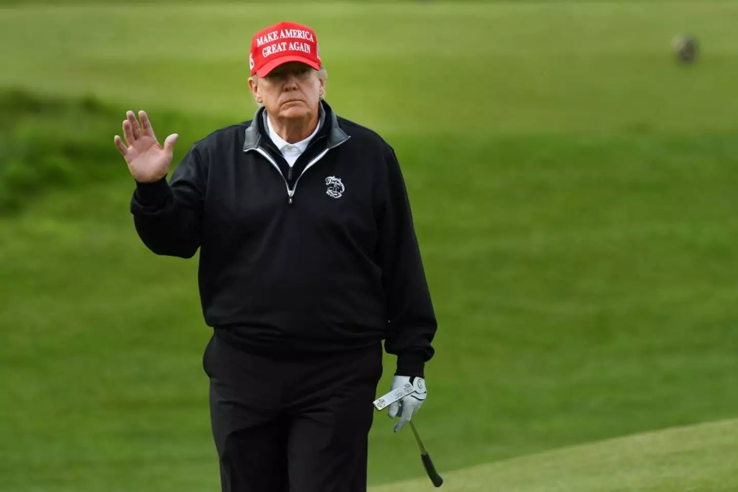 Trump is known for his love of golf and owns courses around the world (ANDY BUCHANAN / Getty Images)