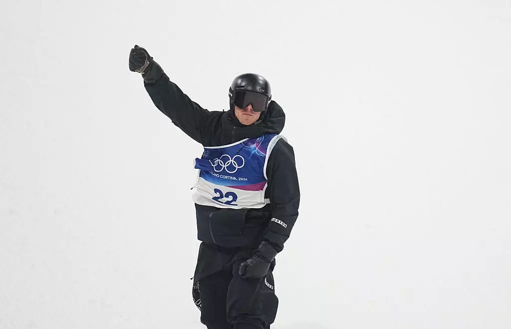 Many Olympic snowboarders choose to wear their bibs over one shoulder when competing (NurPhoto / Contributor / Getty Images)
