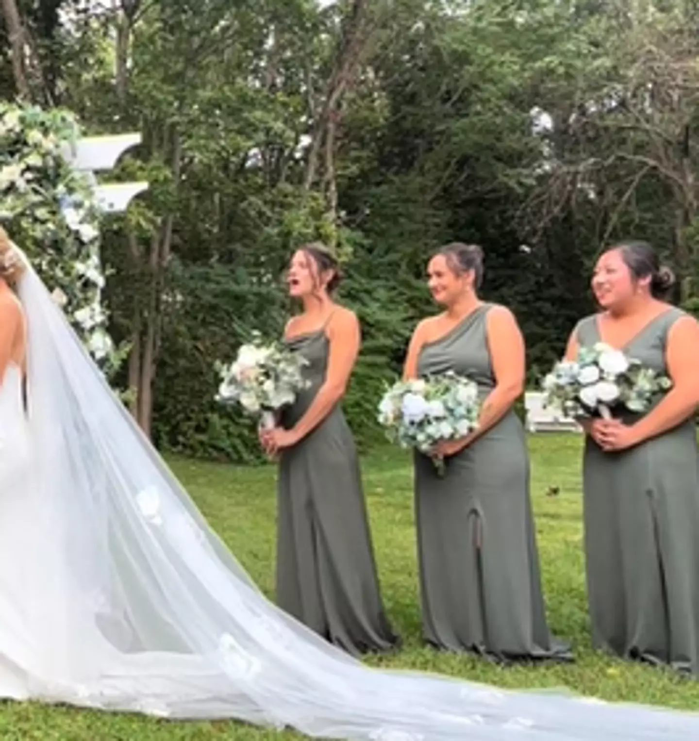 The moment a bridesmaid saw the kitten.