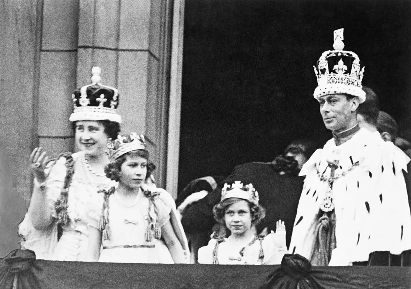 King George VI along with then-Queen Elizabeth, Princess Elizabeth and Princess Margaret Rose (Bettmann / Contributor)