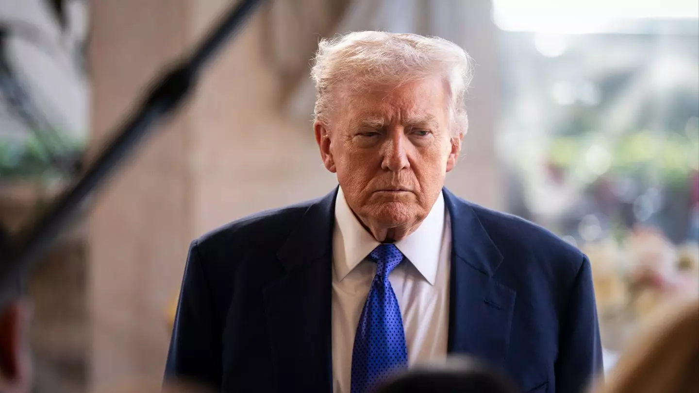 Donald Trump's officials defend him after he posted 'racist' video of Barack and Michelle Obama