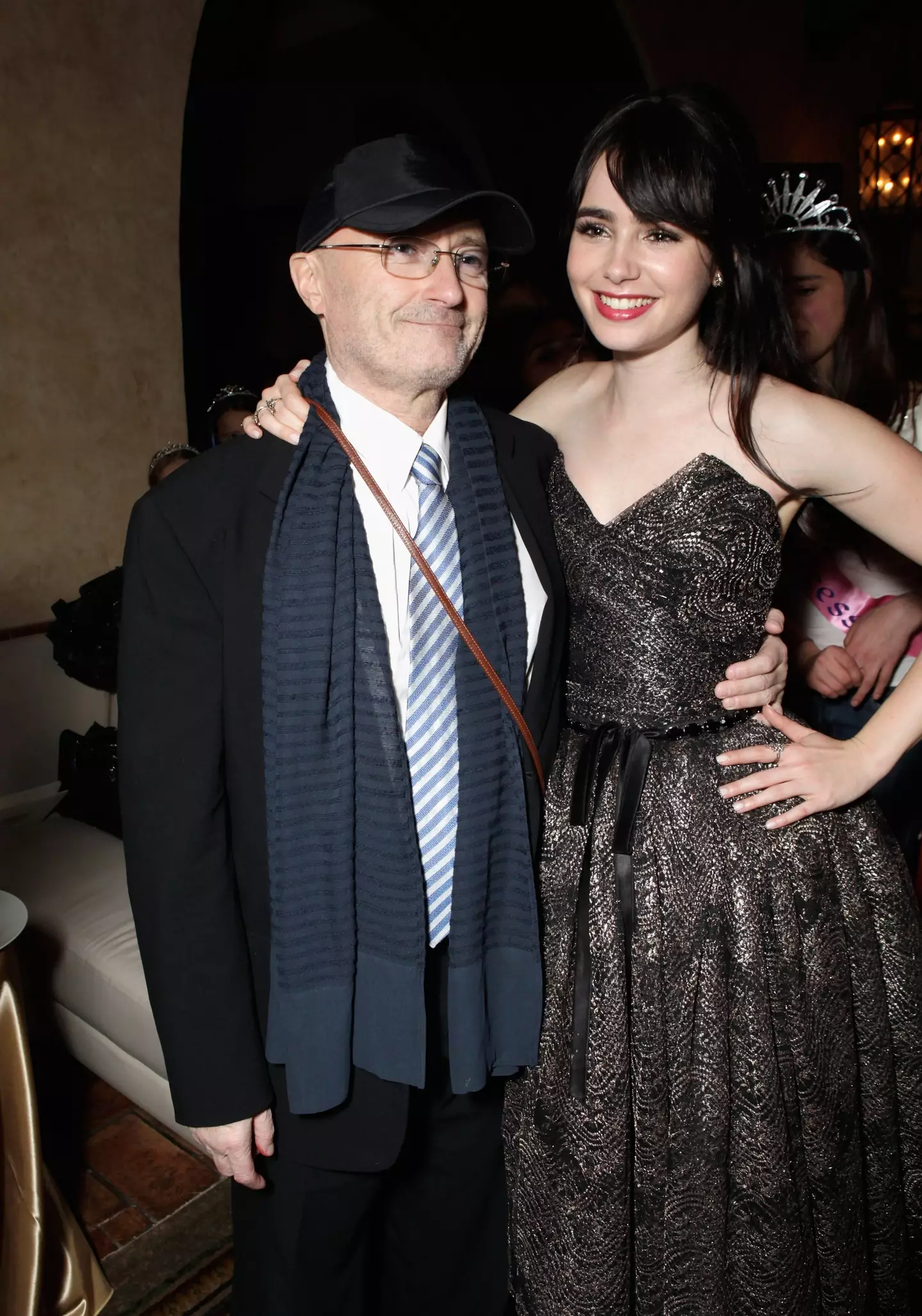 Her father is none other than Phil Collins (Todd Williamson/Getty Images For Relativity Media)