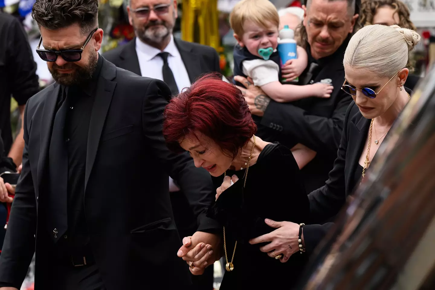 Sharon Osbourne and her children were seen at Ozzy's public funeral procession (Leon Neal/Getty Images)