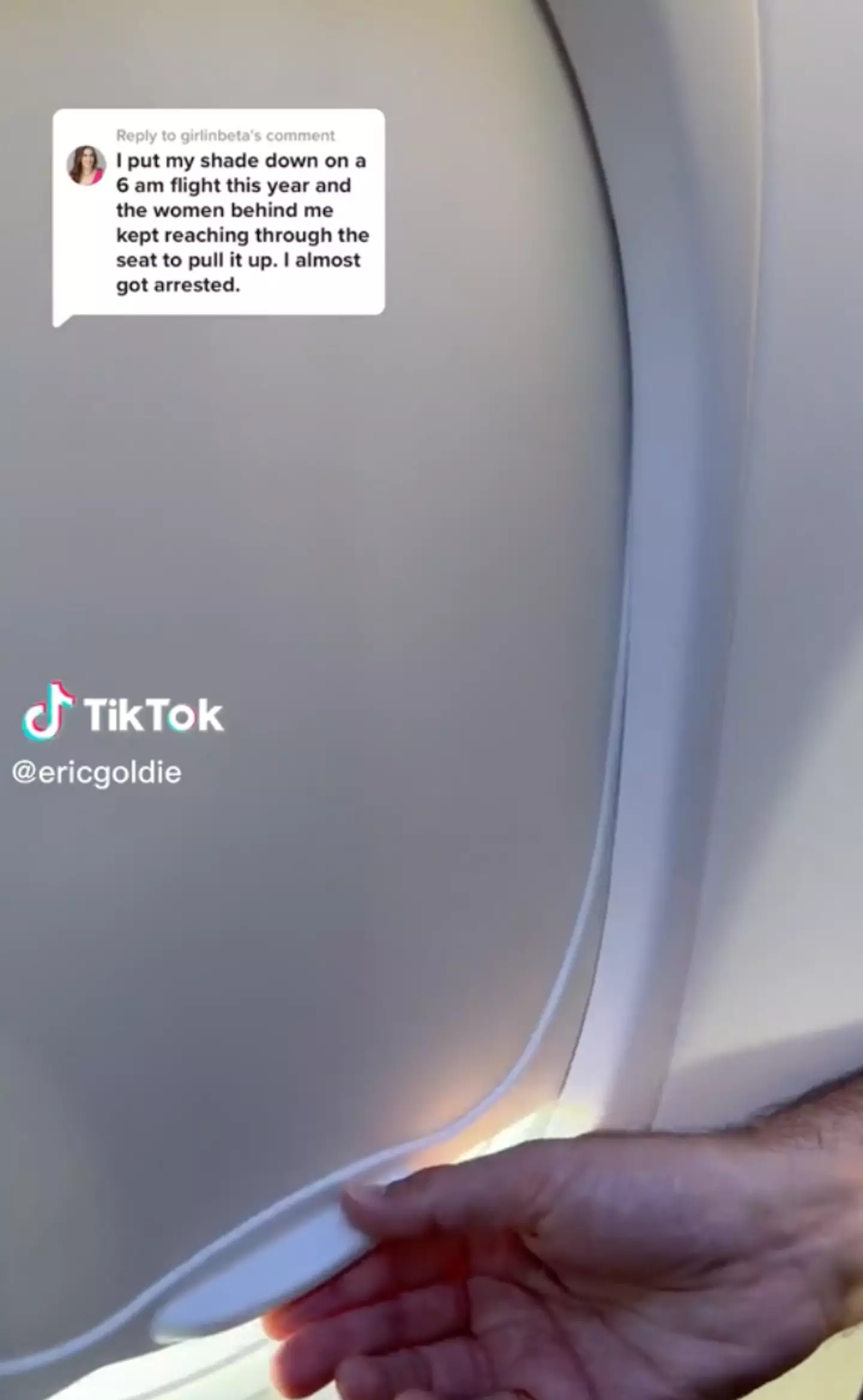 The hand can be seen reaching forward.