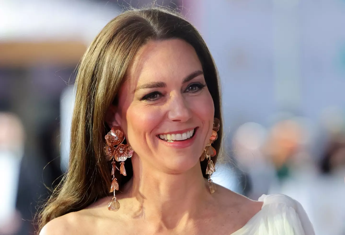 Kate's earrings are from Zara.