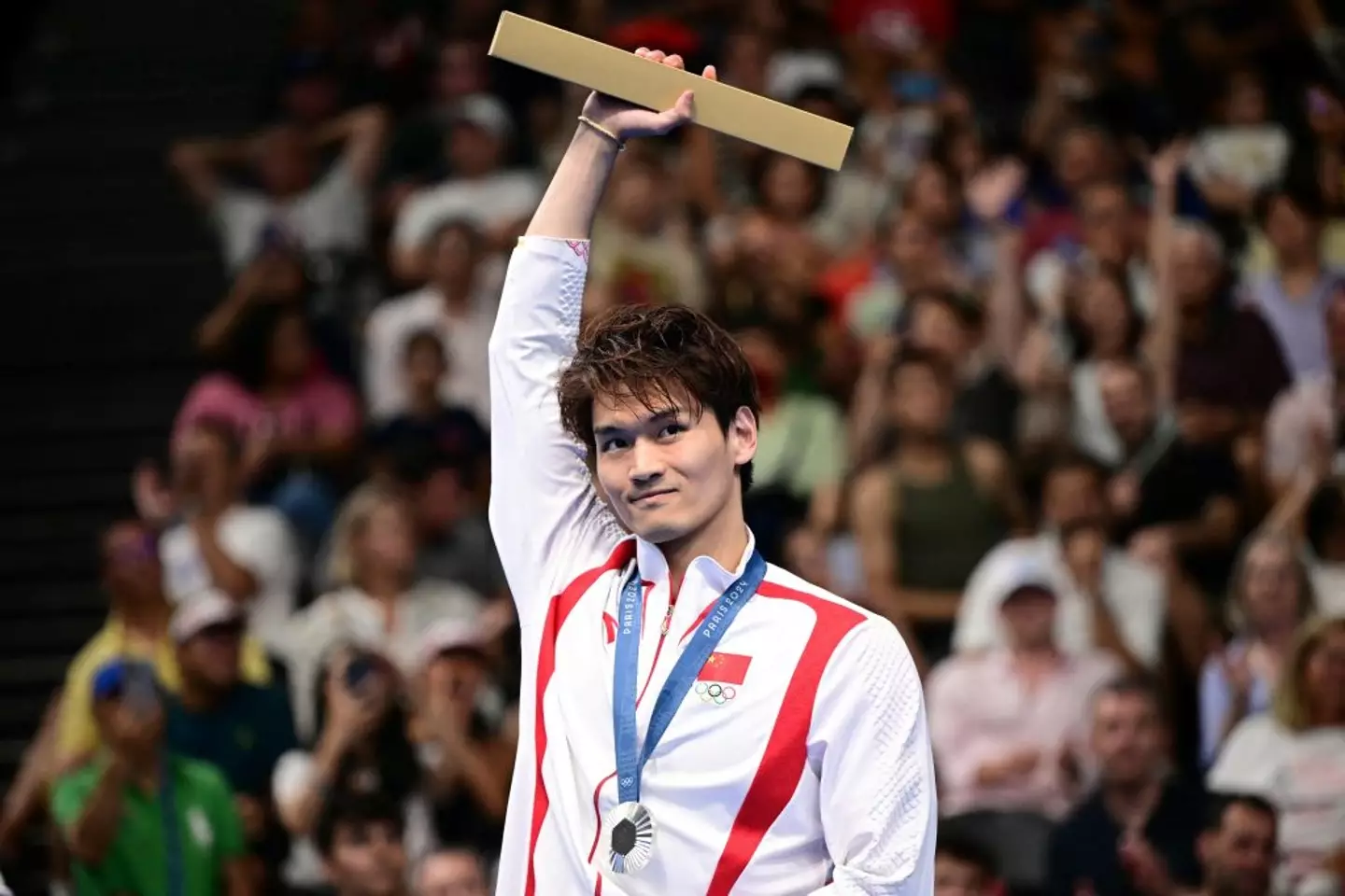 Xu Jiayu didn't show up for heat two of the swimming competition, despite placing silver in the men's 100m backstroke. (FRANCOIS-XAVIER MARIT/AFP via Getty Images)